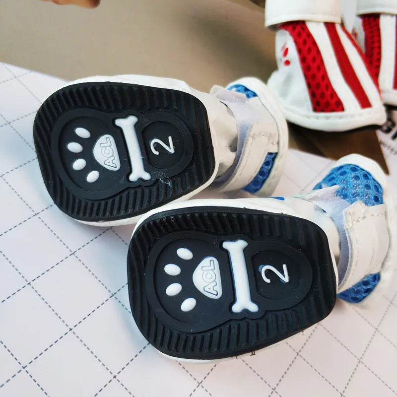 Blue dog shoes with zipper closures and non-slip rubber soles for pet paw protection