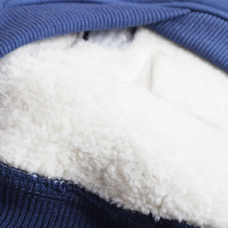 Dark blue cotton winter dog coat with thick fleece lining on a white background