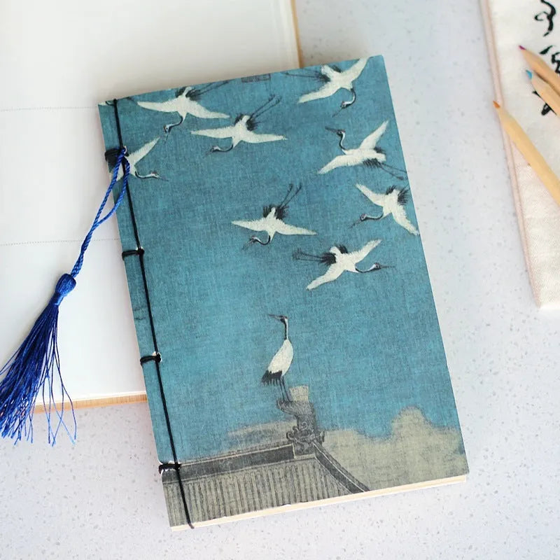 A5 antique wire-bound notebook with retro painting cover, wax rope binding, and tassels