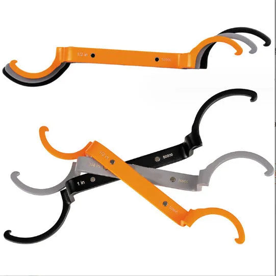 Three colour-coded magnetic suction wrenches with catheter locking in orange, grey, and black