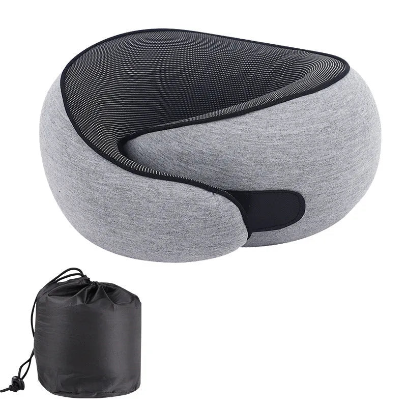 U-shaped memory foam travel neck pillow in light grey with a storage bag.