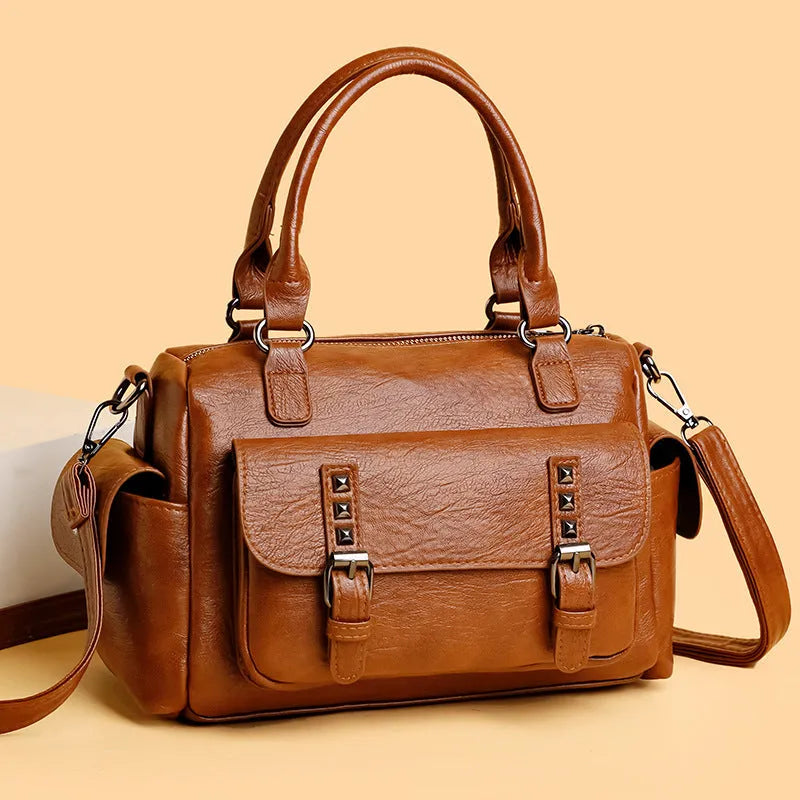 Vintage messenger bag in horizontal square shape with contrast stitching, available in multiple colours