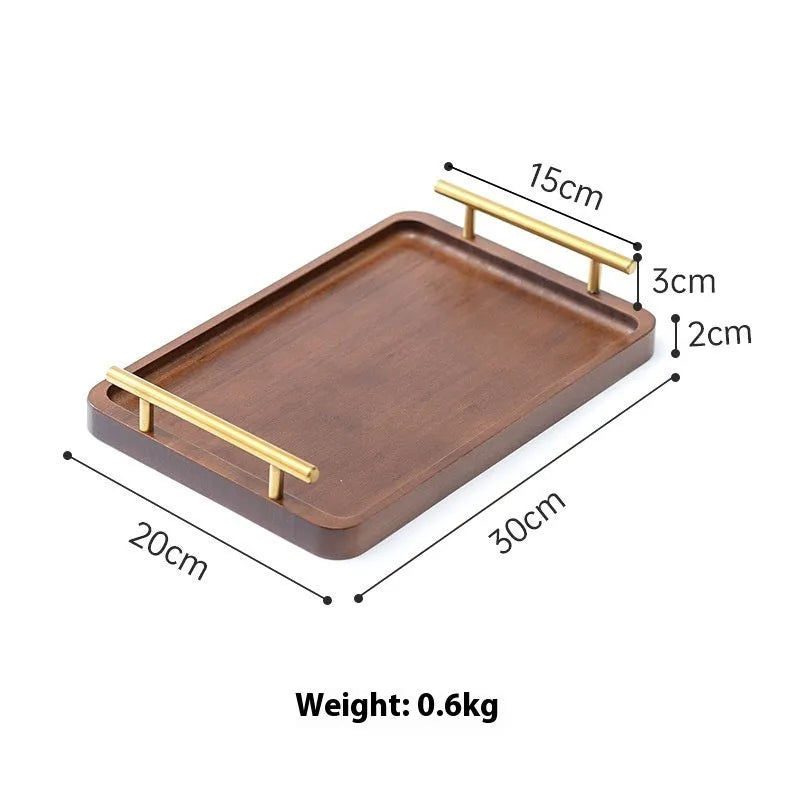 Square brown-handled bamboo serving tray on a table, pastoral style.