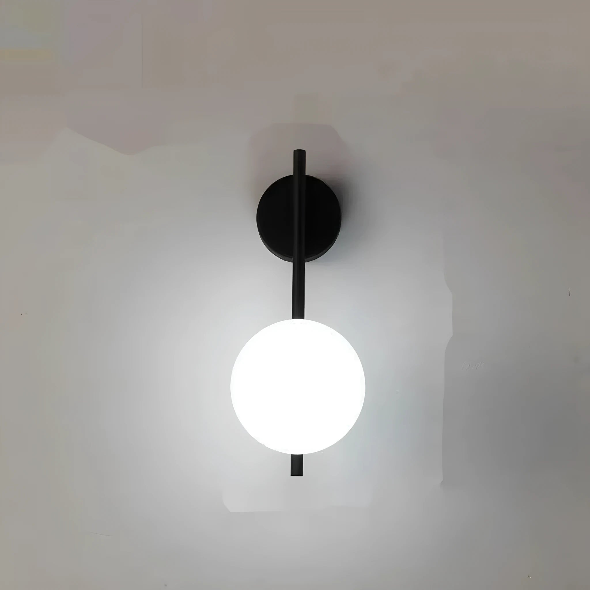 Black wrought iron Nordic wall lamp with milky white glass cover, 12cm wide and 30cm high, for balcony or stairway installation