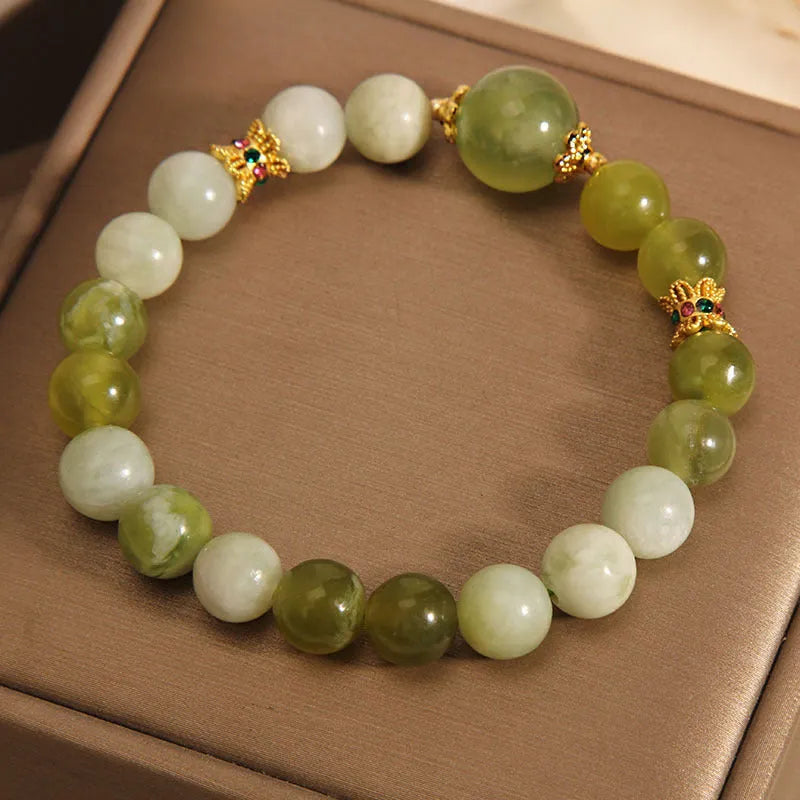 Xiuyan jade green women's bracelet in an original light luxury Mori style design.