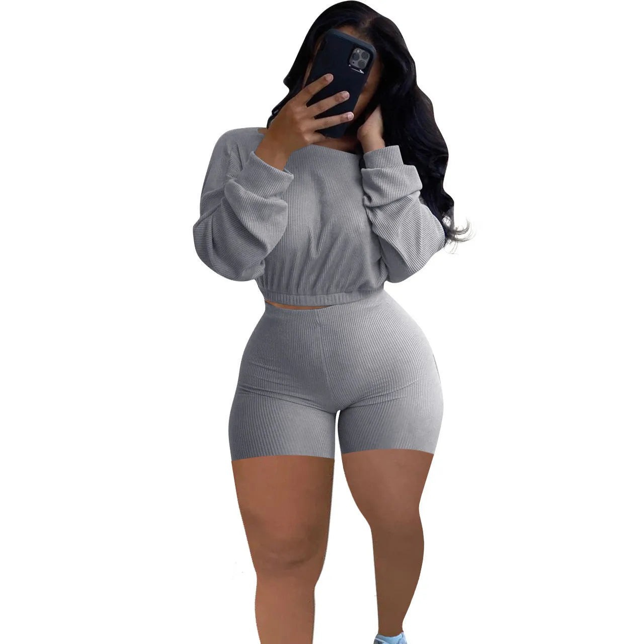 Women's solid colour off-the-shoulder top with sunken stripe detail and matching shorts, a two-piece set with long sleeves.