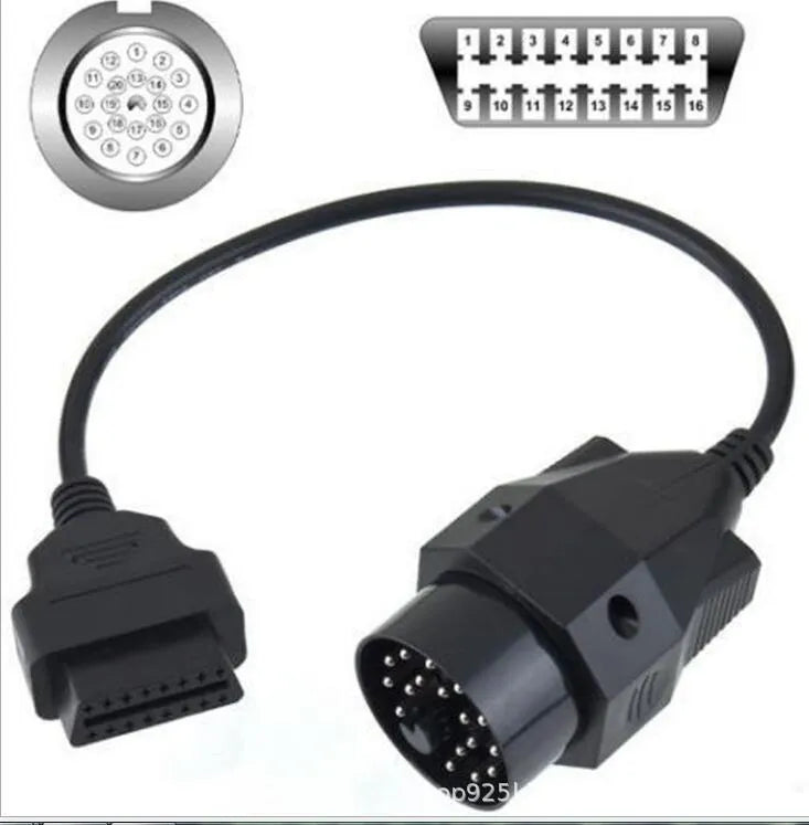 BMW 20-pin male to OBD2 16-pin female diagnostic adapter cable on a workshop bench