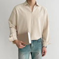 Men's loose lapels casual shirt in polyester fabric showing non-ironing properties and solid colour options