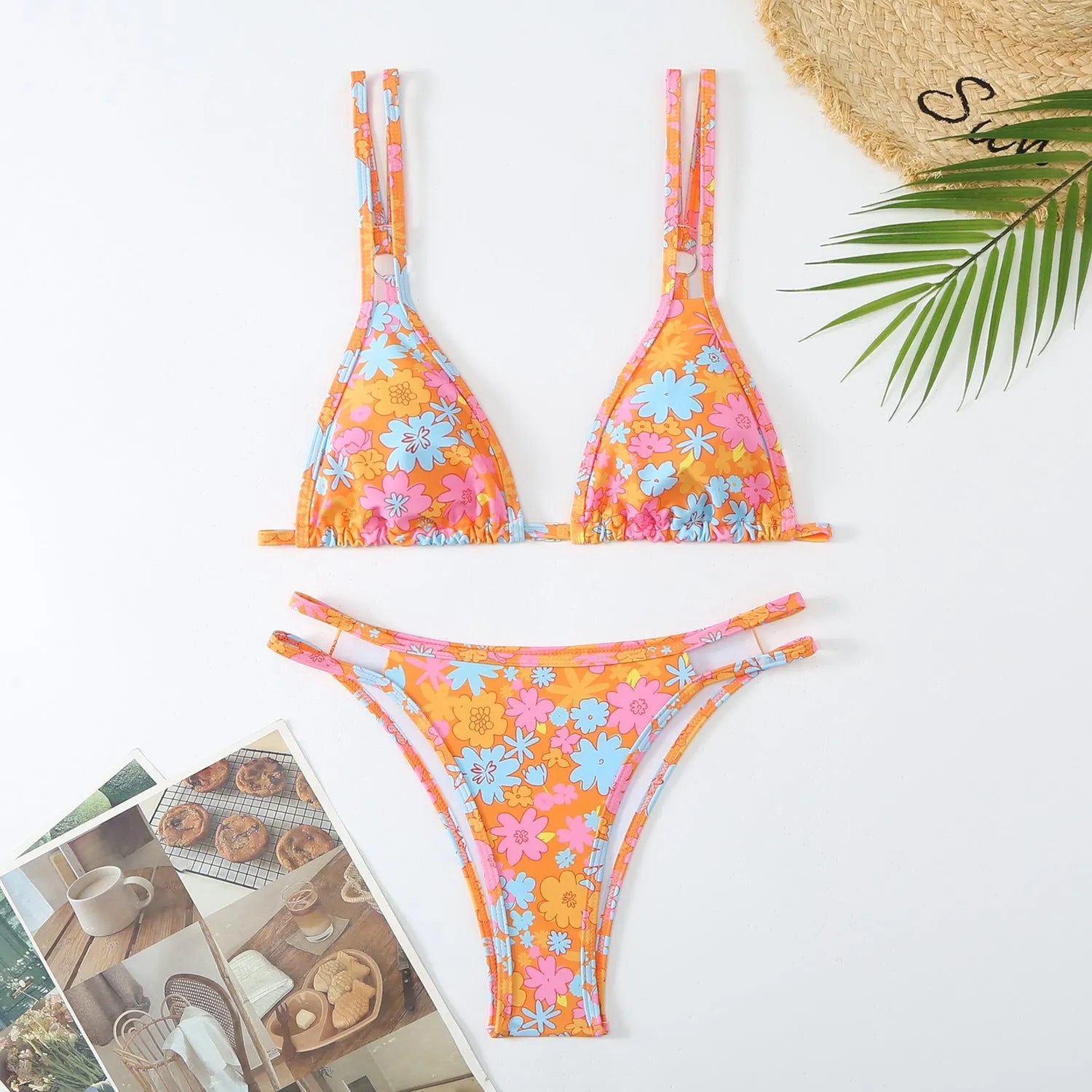 Women's printed halter bikini briefs swimming set in polyester fibre showing floral pattern and backless design