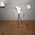 Scandinavian LED table lamp with iron body and acrylic shade on a white table, offering three light colour options