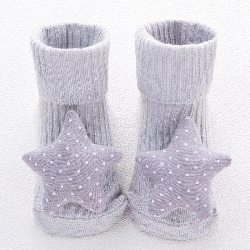 Cotton baby floor socks in various colours and patterns with size guide for ages 0-3 months
