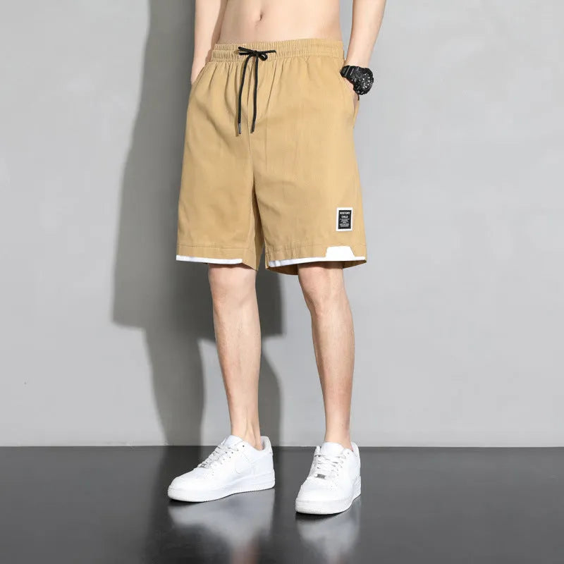 Boys' cotton shorts in black, shown in a casual style for summer home and sports wear.