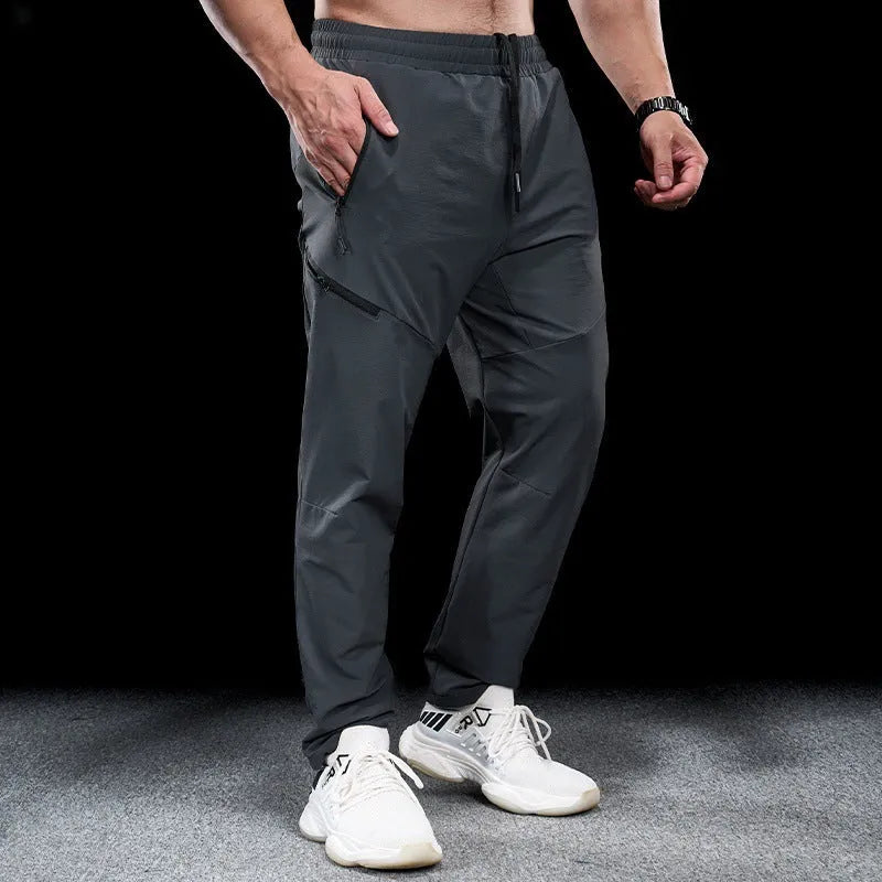 Men's waterproof quick-drying exercise pants in nylon fabric for sports and fitness