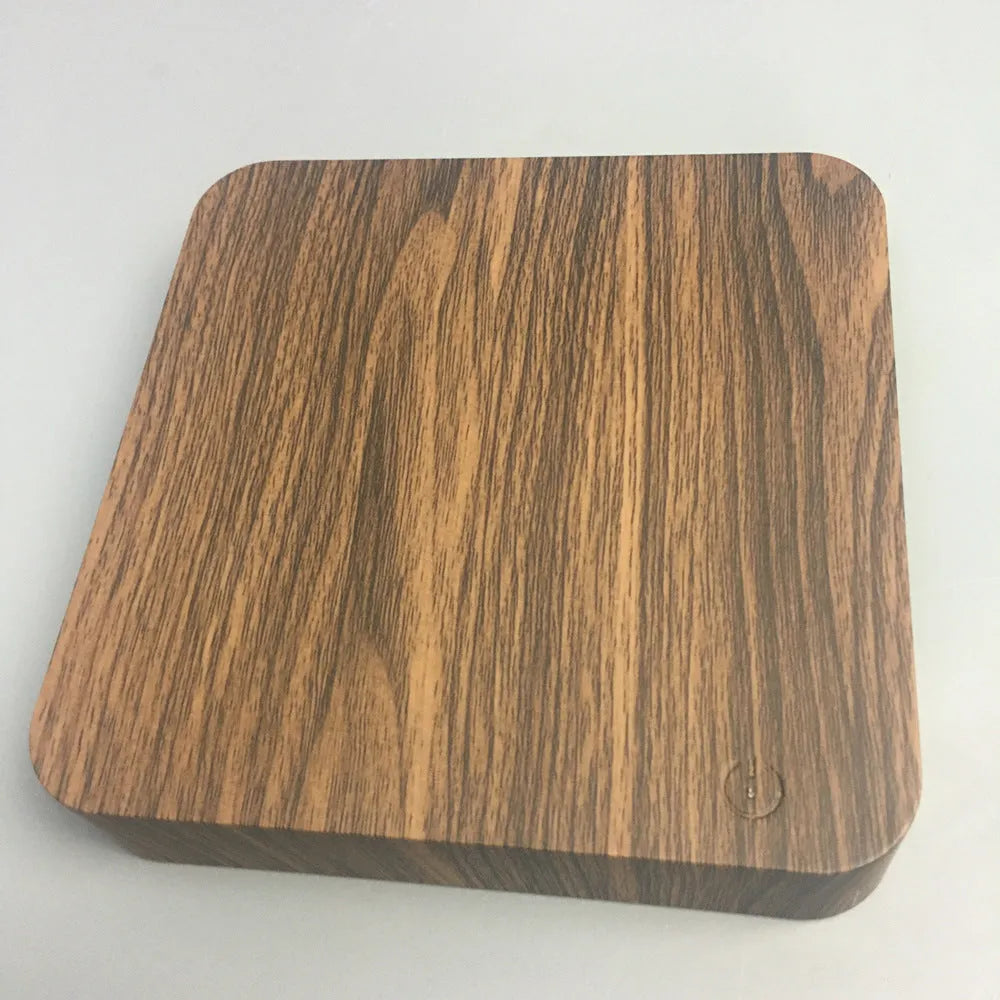 Square walnut magnetic levitation galaxy moon lamp floating above its circular base.