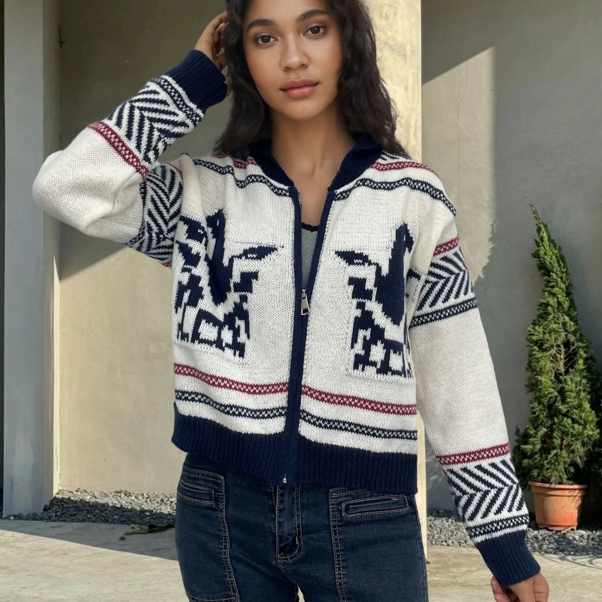 White women's zip cardigan with black contrast stripe jacquard pattern and lapel collar