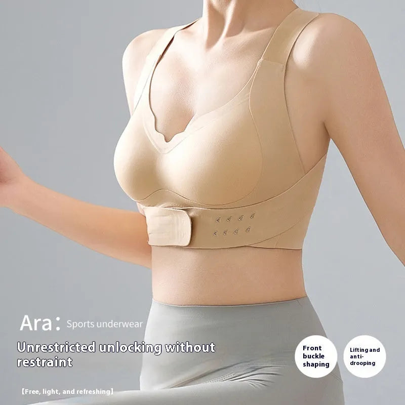 Front-clasp women's yoga sports bra with adjustable criss-cross straps and a shaping back panel.