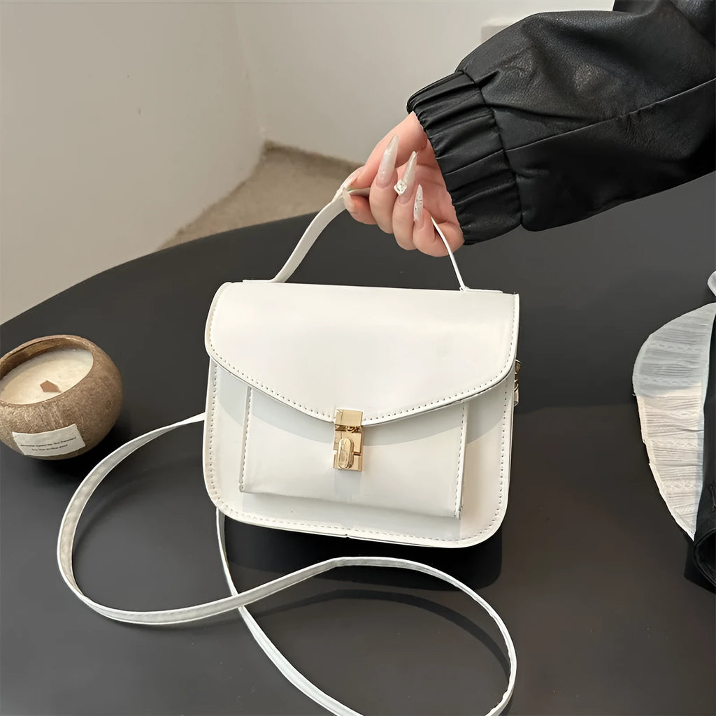 Retro style shoulder messenger bag in horizontal square shape with document compartment
