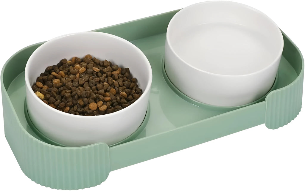 Green ceramic raised cat bowl set with two bowls on a tilted stand