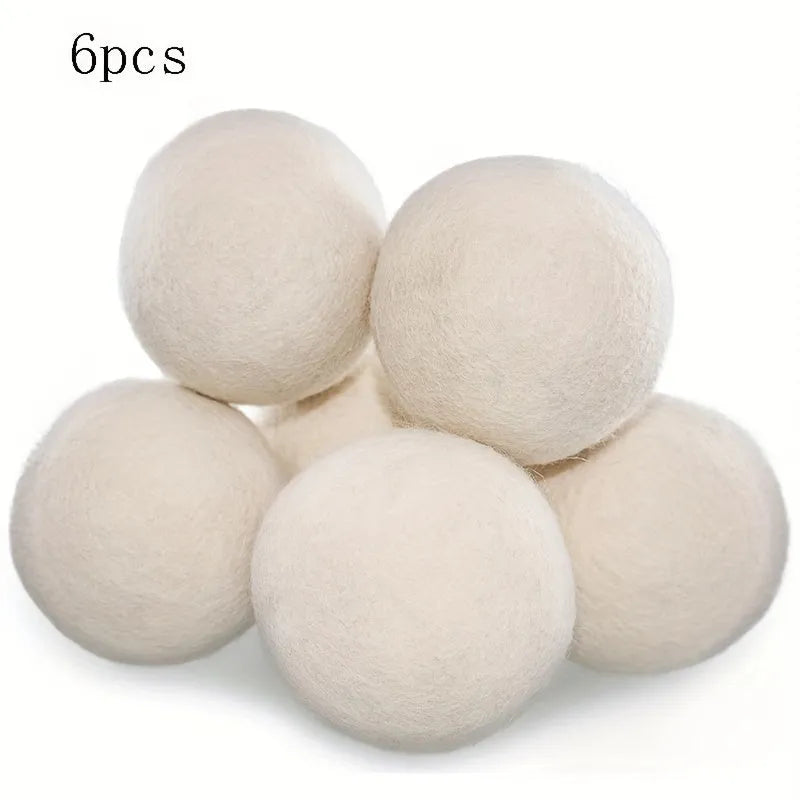 Set of six wool drying balls in three sizes 5cm 7cm 8cm for static reduction and chemical-free fabric softening