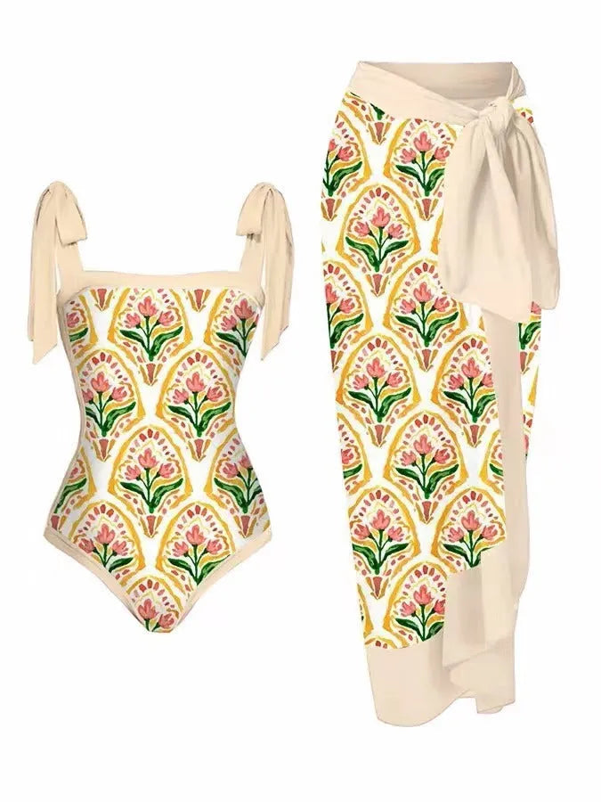 Women's floral print two-piece swimsuit with a sheer chiffon hip skirt, shown in one of the available colour variations.