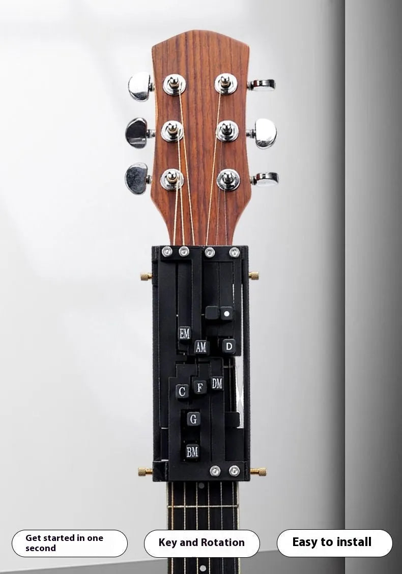 Automatic chord practice device for folk guitar, shown in black, designed for novice second chord training.
