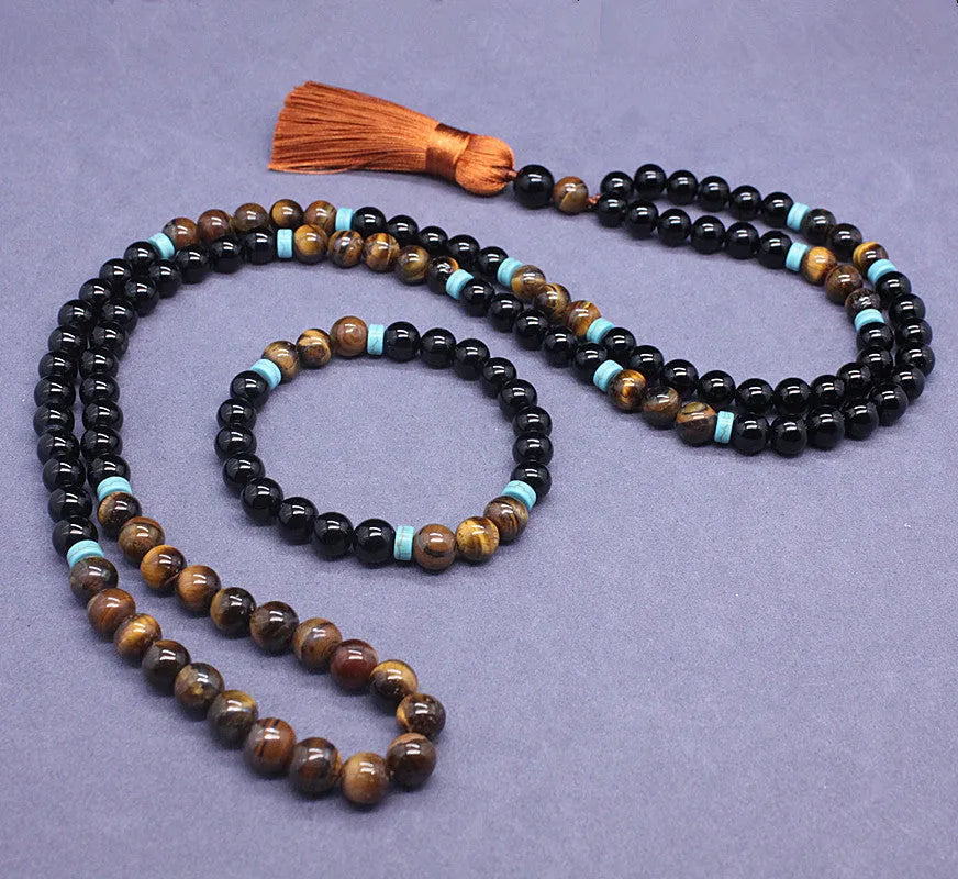 Natural agate jewellery set showing black agate bracelet and Tiger stone necklace with geometric design