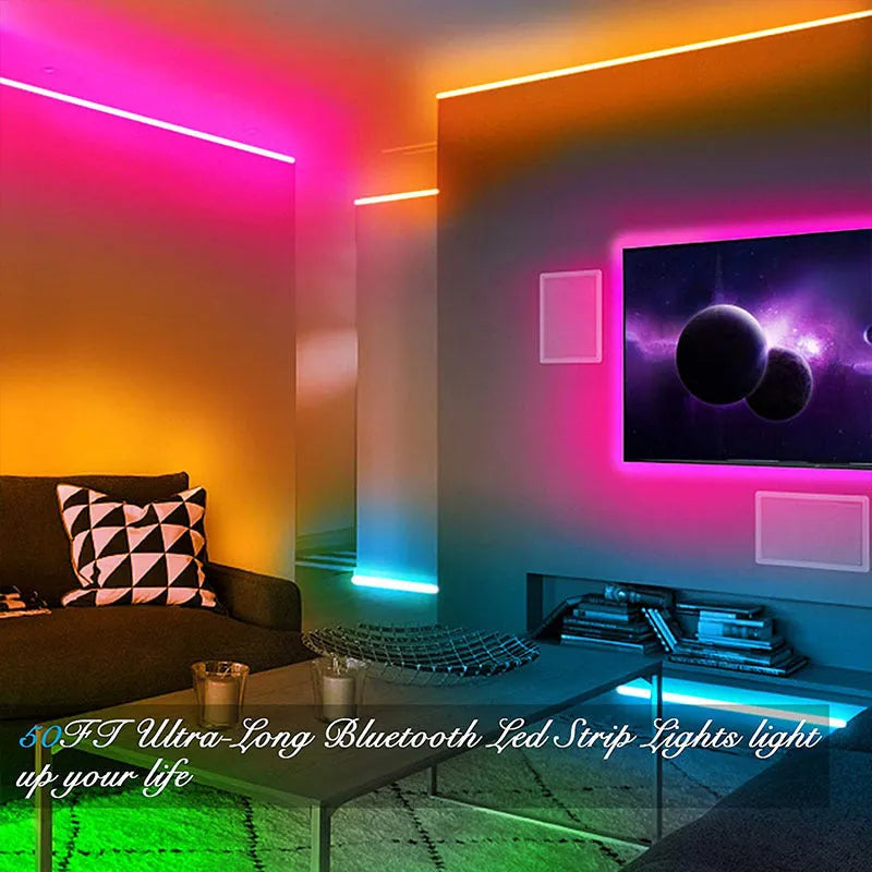Roll of flexible RGB LED strip light with Bluetooth controller and power adapter on a table