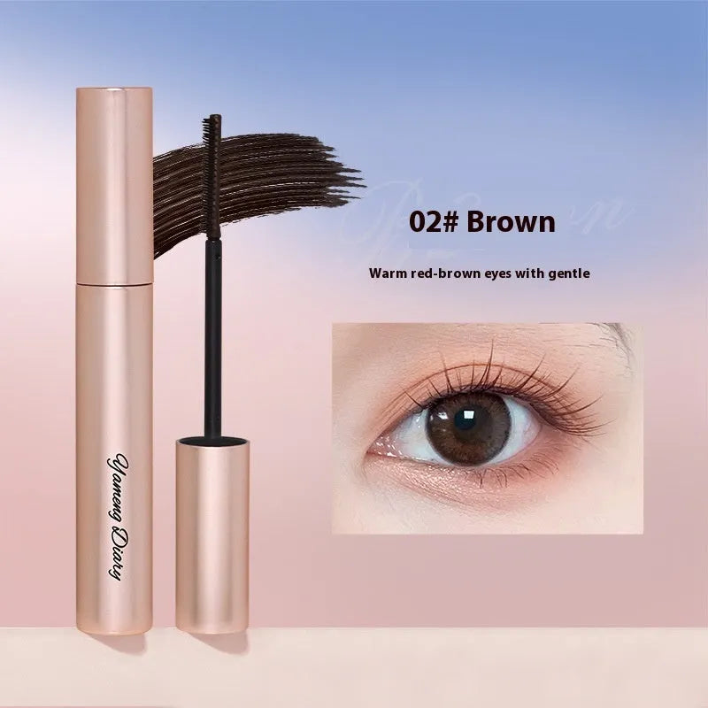 Tube of long curling long-lasting mascara shown in black and brown colour options with applicator wand.