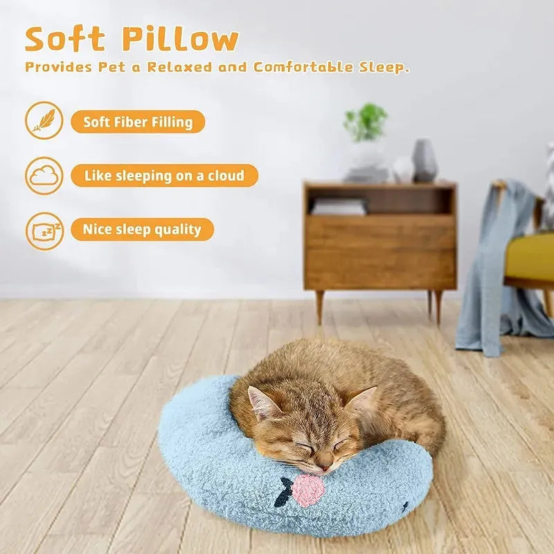 Small half-donut shaped plush pet pillow in blue, showing U-shaped design for cat or small dog neck support.