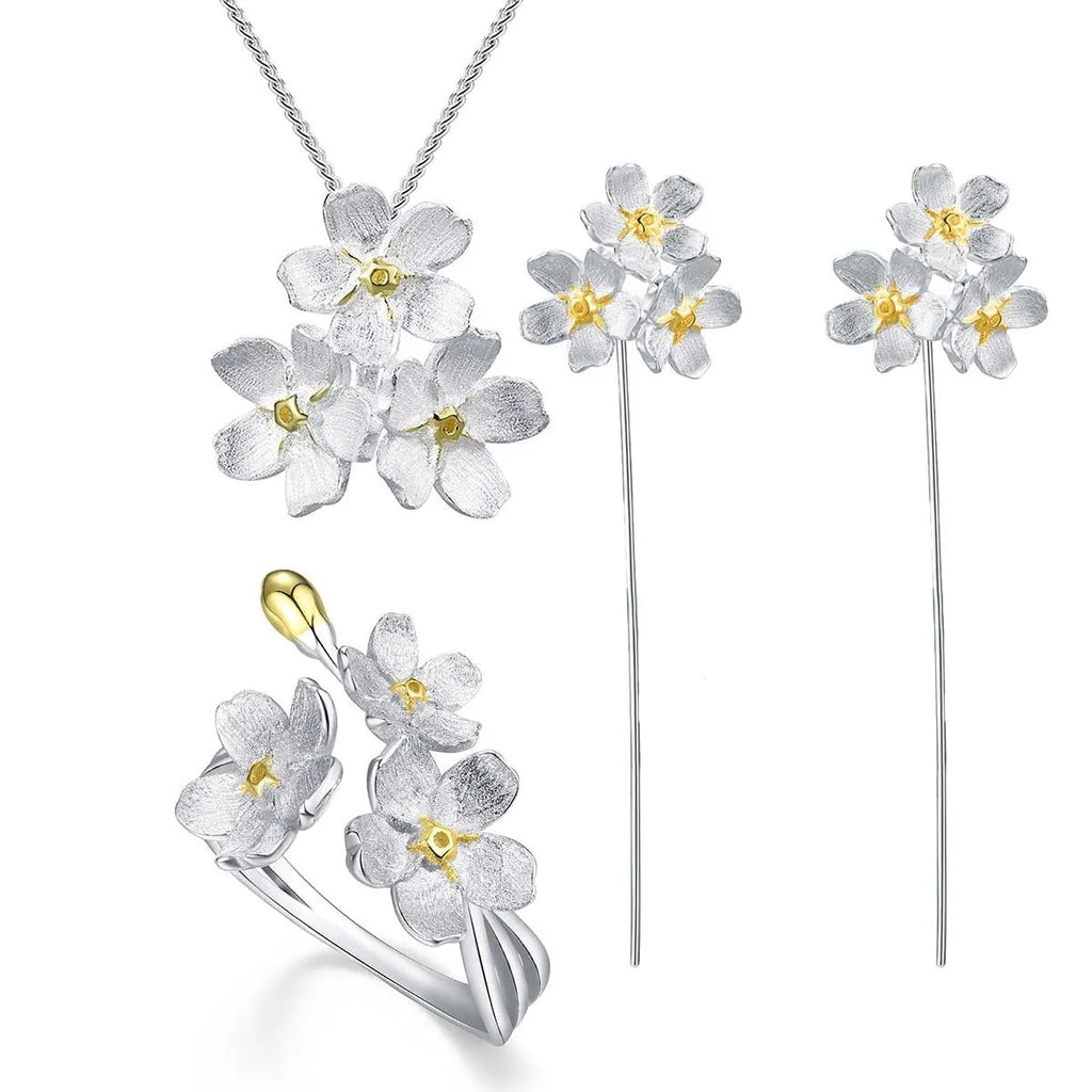 Myosotis Sylvatica sterling silver flower pendant with electroplated finish and hand-designed botanical details