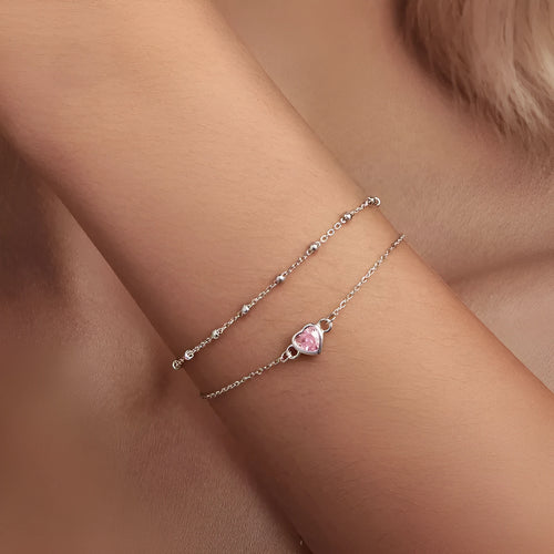 Sweet girlish style 925 sterling silver bracelet with a small heart-shaped pendant on an adjustable chain.