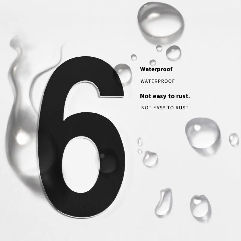 Black stainless steel adhesive house number sign measuring 7.5cm with waterproof construction