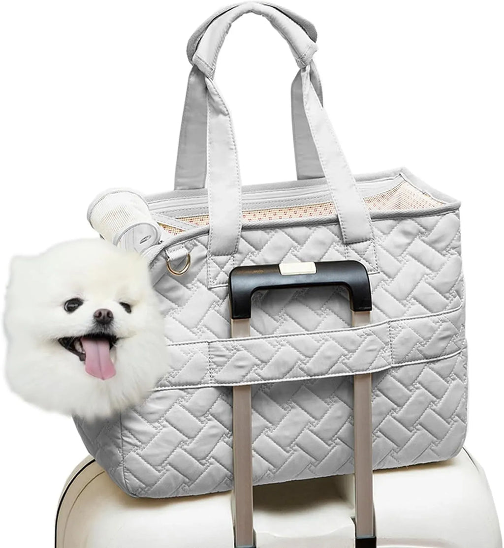 Grey pet carrier handbag with mesh side panels and multiple pockets for a small dog