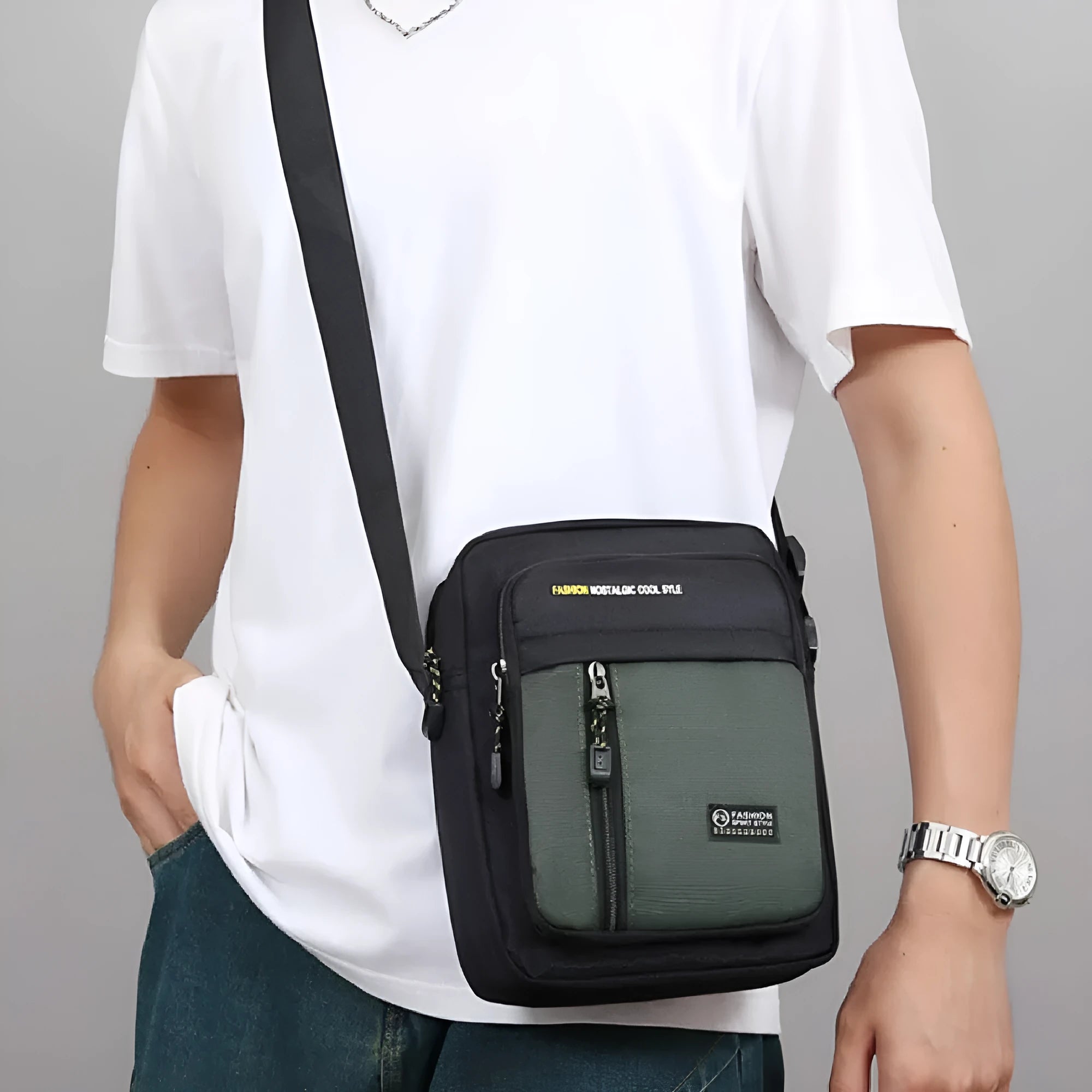 Men's casual nylon crossbody messenger bag in green, shown from the front with sewing thread detail.