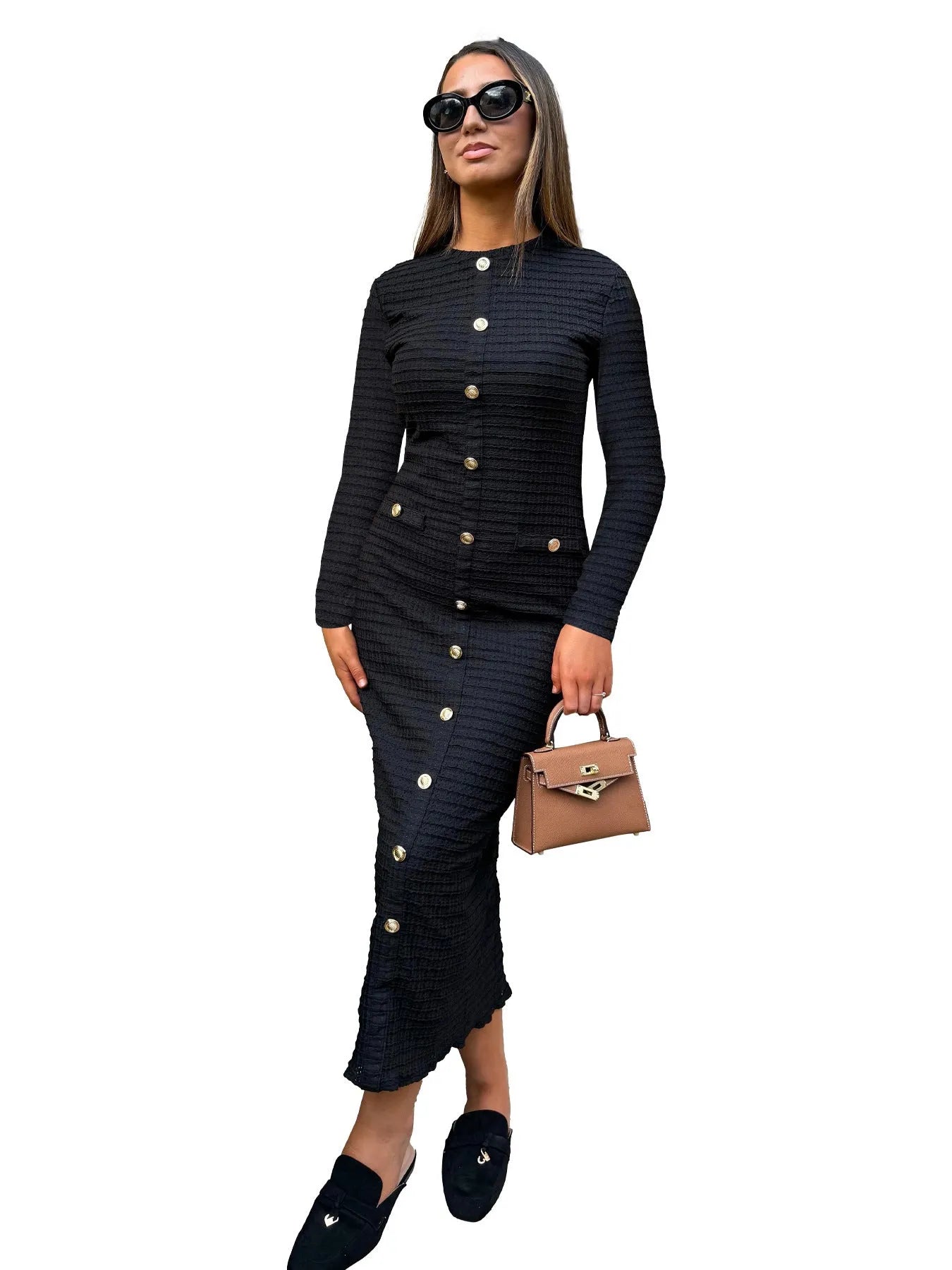 French retro slim fit knitted long-sleeved dress in black shown on a model.