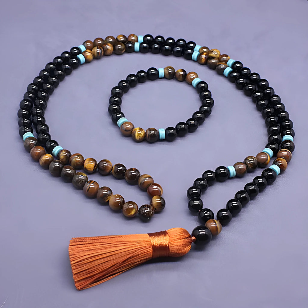 Natural agate jewellery set showing black agate bracelet and Tiger stone necklace with geometric design