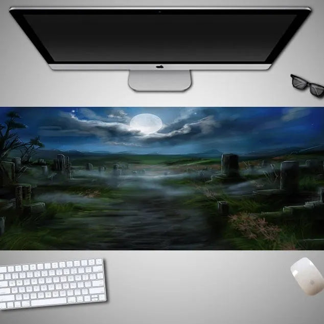 Oversized Halloween graphic cloth mouse pad on a desk, showing non-slip rubber base.