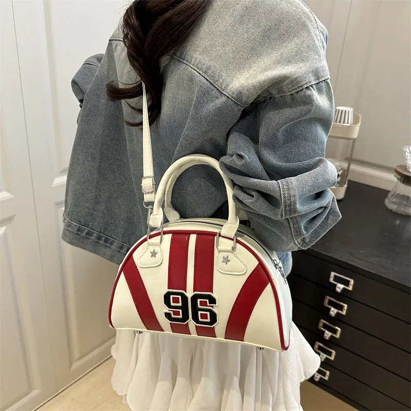 Colourful stripe contrast single shoulder bag in black with stitching and colour blocking details, PU material, dumpling shape