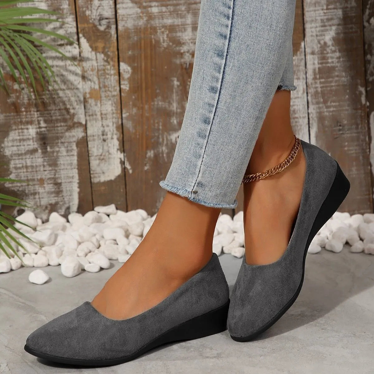 Women's pointed toe wedge pumps in suede with low wedge heel