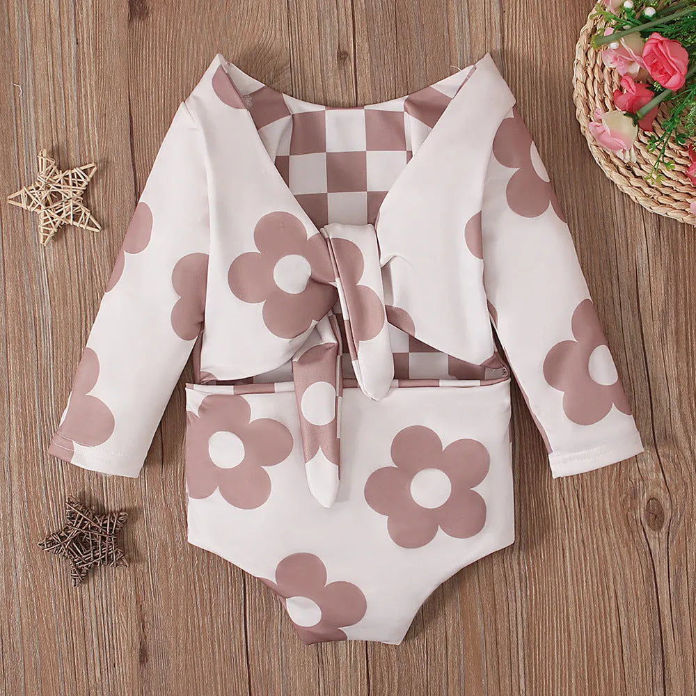Girls' white long sleeve swimsuit with small flower pattern, triangle romper style, polyester blend