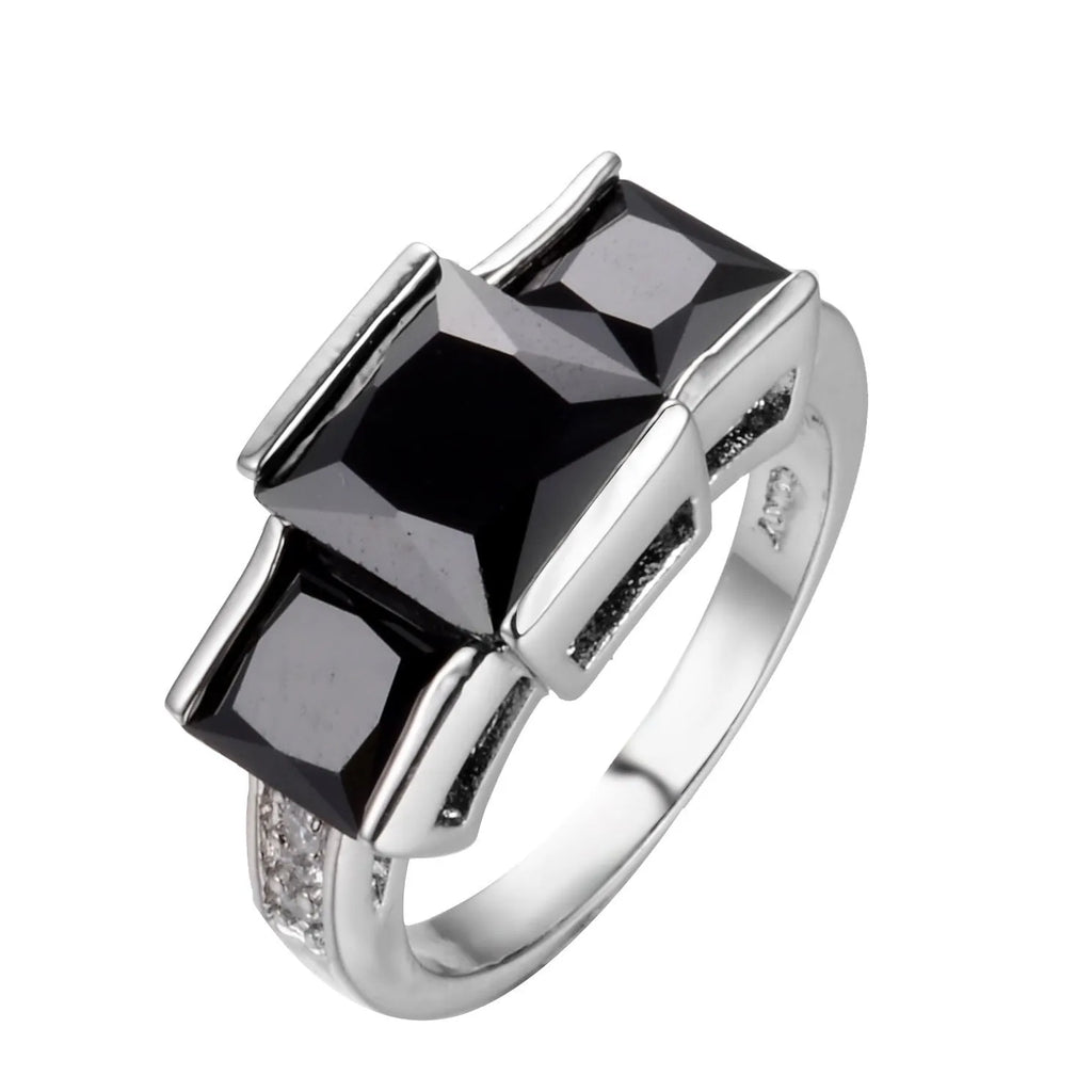 Geometric copper women's ring in champagne colour on a size no.8 finger, showing metal band and electroplated finish.