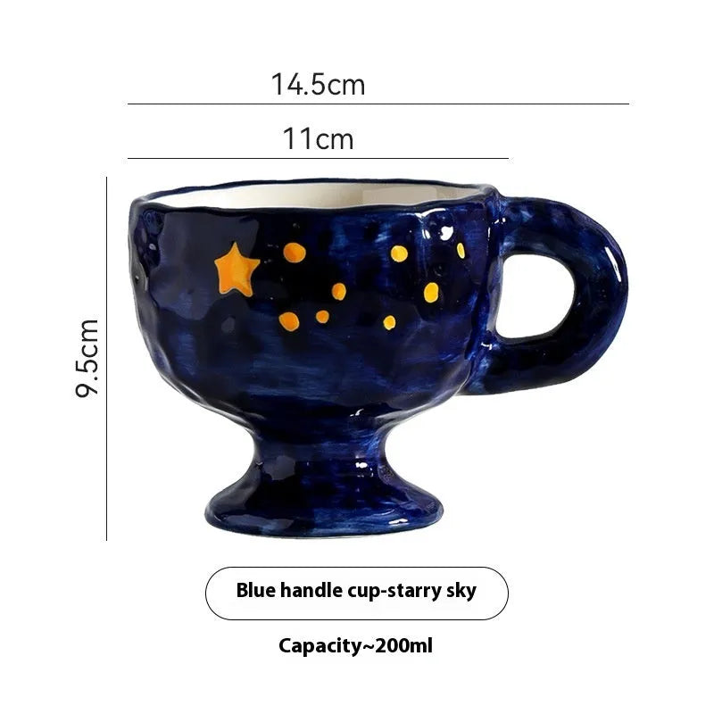 Hand-pinched irregular ceramic mug in solid colour with modern design