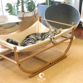 Iron cat hammock pet sofa bed in milk tea colour on a white background, semicircle design