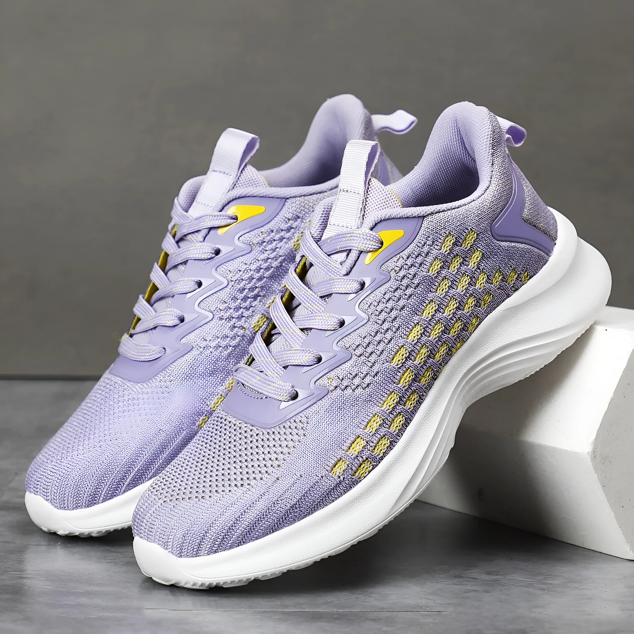Women's lavender purple Flyknit running shoes with mesh upper and EVA sole for athletic use
