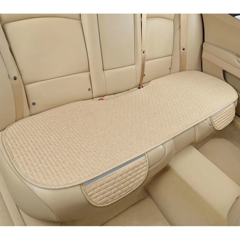 Linen car seat cushion with plaid design available in single seat or three-piece set configurations