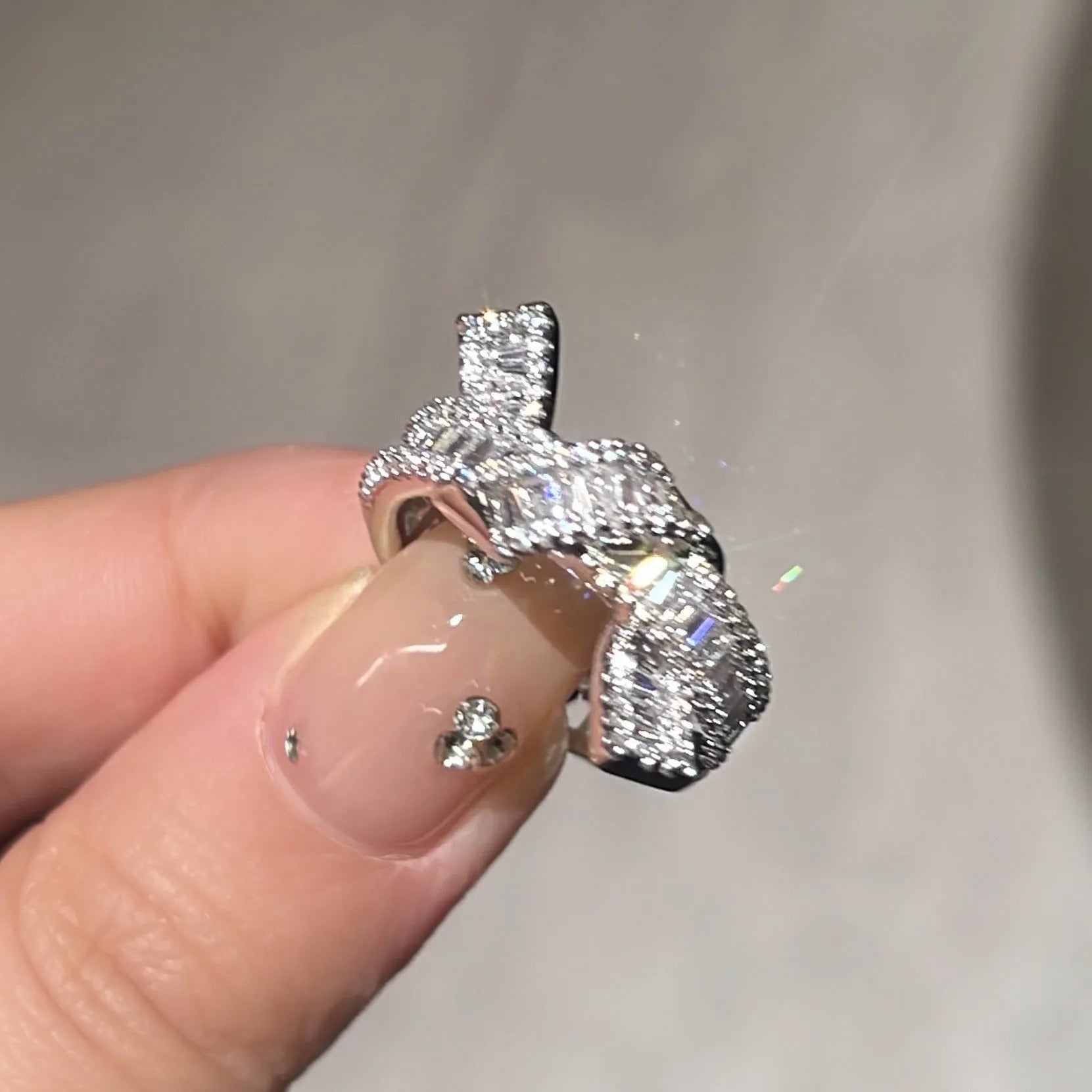 Silver cross open ring with bow shape, copper base with electroplated finish, minimalist light luxury style