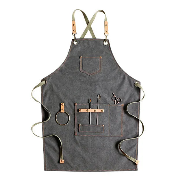 Canvas apron with cross-back straps in camel colour for cafe or baking work