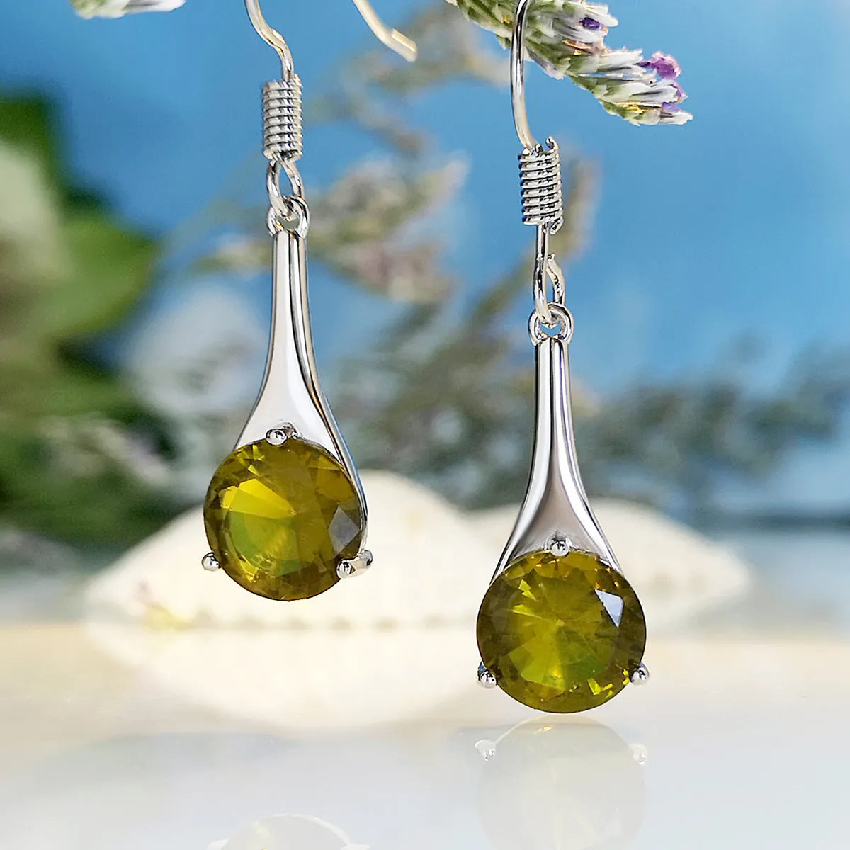 Olive green water drop shaped retro earrings with minimalist design on alloy base