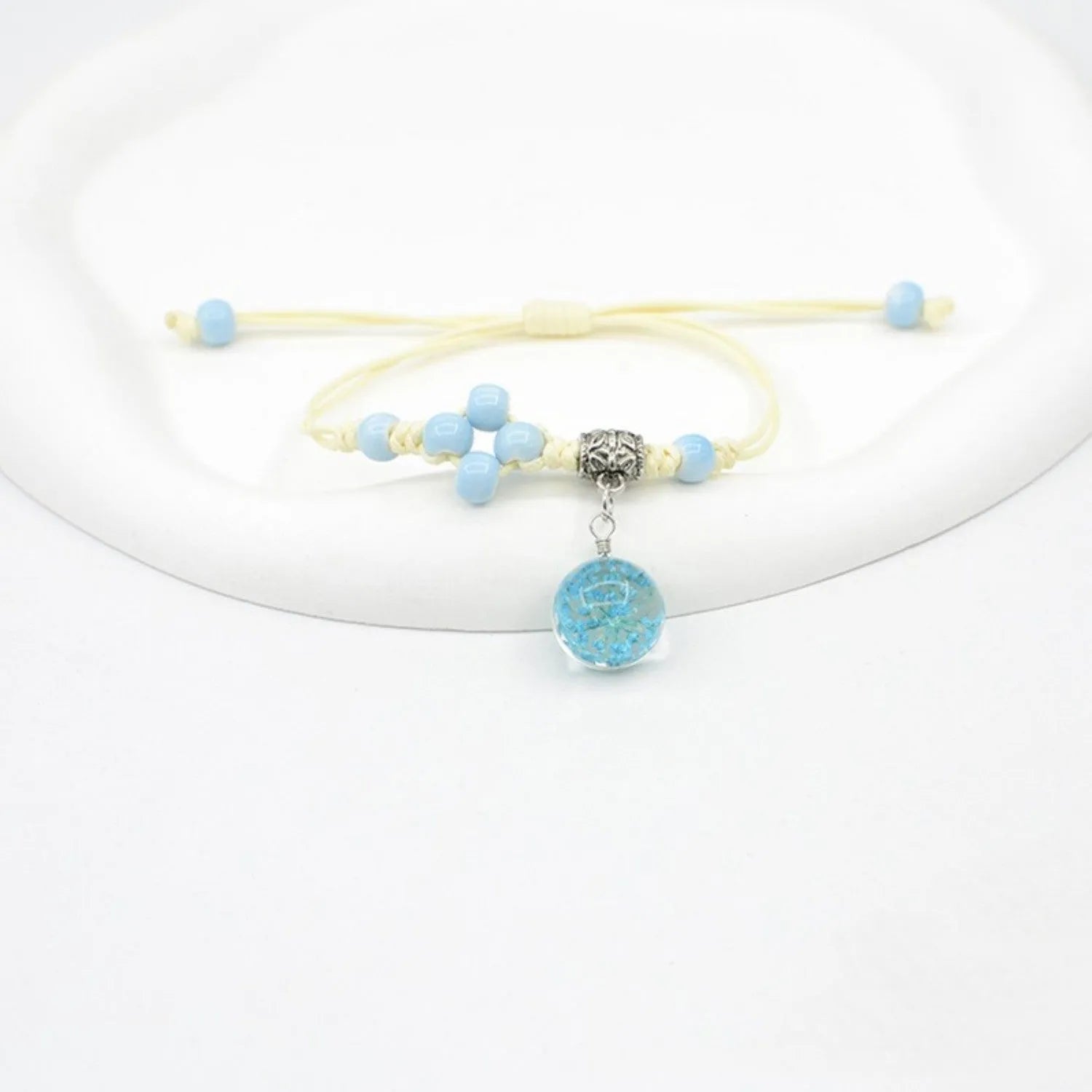 Women's hand-woven glass dried flower bracelet with large 1.4 cm beads in multiple colour options.