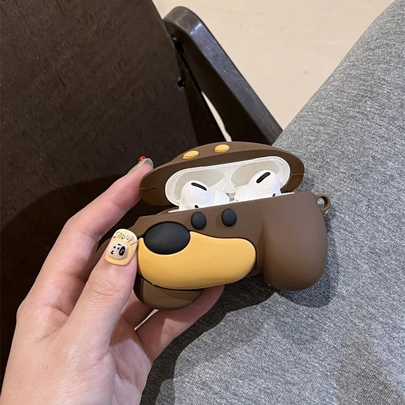Brown puppy silicone earphone case on AirPods charging case with embossed cartoon design